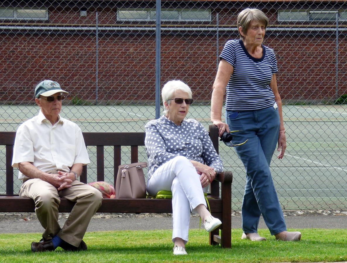 Trevor and Margaret Day on the bench with former Marlow bowler Lynda Taplin standing.